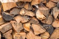 Natural wood background, close-up. The firewood is laid and prepared for the winter pile of wooden logs. Royalty Free Stock Photo