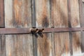 Natural wood doors with rusty metal handles, background. Royalty Free Stock Photo