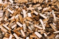 Natural wooden background, closeup of chopped firewood. Firewood stacked and prepared for winter Pile of wood logs Royalty Free Stock Photo