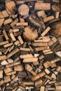 Natural wooden background, closeup of chopped firewood. Pile of wood logs. Royalty Free Stock Photo