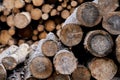 Natural wooden background - closeup of chopped firewood. Firewood stacked and prepared for winter Pile of wood logs Royalty Free Stock Photo