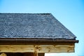 Natural wooden tiles made of larch. Wooden shingles is a unique coating and beautiful roofing and facade material.