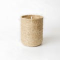 Natural woven basket with a textured surface against a clean white background Royalty Free Stock Photo