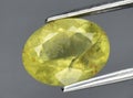 natural yellow beryl gem on the background Royalty Free Stock Photo