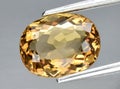 natural yellow beryl heliodor gem on the background Royalty Free Stock Photo