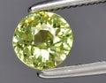 natural yellow green grossular garnet gem on the background Royalty Free Stock Photo