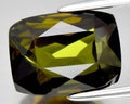 natural yellow green tourmaline gem on the background Royalty Free Stock Photo