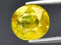 natural yellow grossular garnet gem on the background Royalty Free Stock Photo