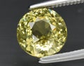 natural yellow grossular garnet gem on the background Royalty Free Stock Photo