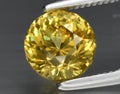 natural yellow grossular garnet gem on the background Royalty Free Stock Photo