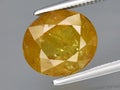 natural yellow grossular garnet gemstone on the background Royalty Free Stock Photo
