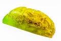 Natural yellow soap with homemade glycerin with lemon flowers, exposed on a white background. The concept of using paraben-free