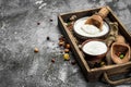 Natural yogurt with a scoop in a bowl.