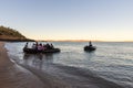 Naturalist Island, W.A. Australia - Jun 26 2019: Tourists from a luxury expedition cruise ship land from Zodiacs on a remote