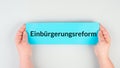Naturalization reform is standing in german language on the paper, new law in Germany for immigrants and asylum seekers Royalty Free Stock Photo