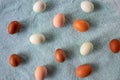 Naturally Colorful Chicken Eggs in a Pattern on a Blue Background