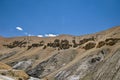 Naturally formed rock shapes and mountains with beautiful blue sky , clouds background on adventurous road from Manali to Leh in