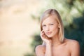 Naturally gorgeous. Portrait of a beautiful young blonde woman sitting after a relaxing spa treatment.