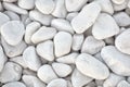 Naturally polished white rock pebbles background. white stones Royalty Free Stock Photo