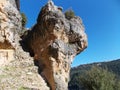 A naturally sculptured rock in Lebanon standing on a high cliff