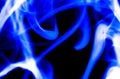 Nature Abstract: The Delicate Beauty and Elegance of a Wisp of Blue Smoke Royalty Free Stock Photo