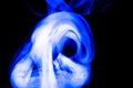 Nature Abstract: The Delicate Beauty and Elegance of a Wisp of Blue Smoke Royalty Free Stock Photo