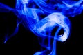 Nature Abstract: The Delicate Beauty and Elegance of a Wisp of Blue Smoke Royalty Free Stock Photo