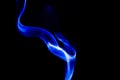Nature Abstract: The Delicate Beauty and Elegance of a Wisp of Blue Smoke Royalty Free Stock Photo