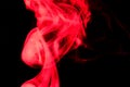 Nature Abstract: The Delicate Beauty and Elegance of a Wisp of Red Smoke Royalty Free Stock Photo