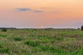 Nature background. Bales of straw on the autumn meadow during wonderful sunset light