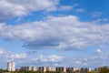 Nature background. Blue sky with cloud over houses Royalty Free Stock Photo