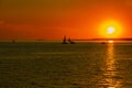 Nature background, beautiful sunset at sea with sailboats Royalty Free Stock Photo