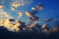 Gray and yellow clouds illuminated by rising sun Royalty Free Stock Photo