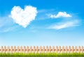 Nature background with blue sky and heart shape cloud. Royalty Free Stock Photo