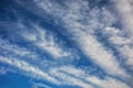 Nature background: Elongated clouds against the blue sky