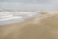 Nature background featuring sand gone with wind in summer windy day on North Sea coast near the Hague in the Netherlands Royalty Free Stock Photo