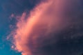 Nature background with mammatus clouds, right before thunderstorm. Dark dramatic sky with stormy violet clouds before the rain