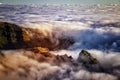 Nature background with sunrise over clouds. It is on the top of Pico do Arieiro mountain, Madeira island, Portugal. The mountains Royalty Free Stock Photo