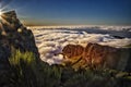 Nature background with sunrise over clouds. It is on the top of Pico do Arieiro mountain, Madeira island, Portugal. The rising sun Royalty Free Stock Photo