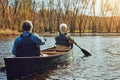 Nature is calling and we must go. a senior couple going for a canoe ride on the lake.