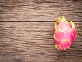 Nature can be pretty weird sometimes, Dragon-fruit are nutritious tropical fruit That way your fruits setup on wooden background. Royalty Free Stock Photo