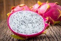 Nature can be pretty weird sometimes, Dragon-fruit are nutritious tropical fruit That way your fruits setup on wooden background. Royalty Free Stock Photo