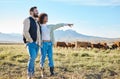 Nature, cows and couple standing on farm for sustainable, agriculture or organic livestock maintenance. Agro, farming Royalty Free Stock Photo