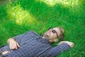 Nature fills him with freshness and inspiration. Guy relaxed peaceful enjoy freshness of grass. Man unshaven guy lay on Royalty Free Stock Photo