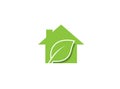 Nature-friendly home a green eco house with a leaf for logo design Royalty Free Stock Photo