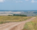 Nature. Good weather. Sunny day. Country road. Royalty Free Stock Photo