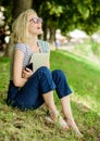 Nature inspiring environment. Girl carefree student worker laptop relaxing outdoors sit green grass. United with nature