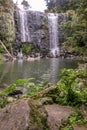 Nature in Kerikeri, New Zealand: mossy rocks and ferns at Wairoa Stream (Te Wairere) waterfall, Northland, North Island, NZ Royalty Free Stock Photo