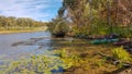 Nature lake autumn reflection with boat. Landscape trees water river background Royalty Free Stock Photo