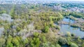 Nature and landscape: Aerial view of a forest and lakes, green and trees in a wild landscape. Royalty Free Stock Photo